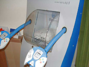 Closer look of European Dreamcast Kiosk with Dreamcast thinking inside